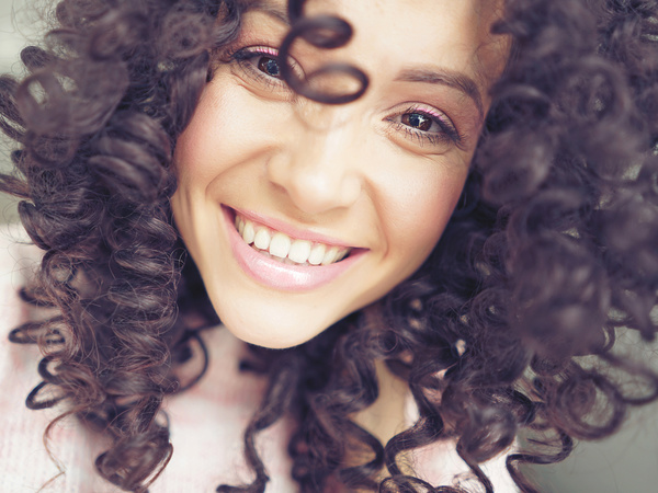 Smiling black curly woman Stock Photo 01