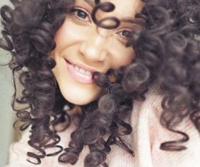 Smiling black curly woman Stock Photo 02