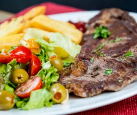 Steak with all kinds of vegetables Stock Photo