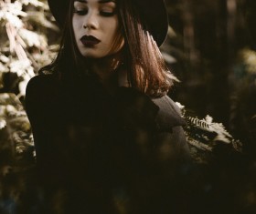 Stylish young model posing in black Stock Photo