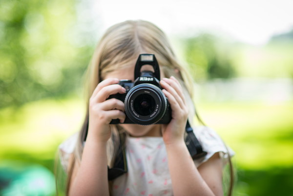 Take pictures of the little girl Stock Photo