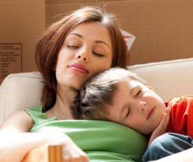 The little boy who slept with her mother Stock Photo