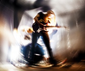 The man who plays the guitar Stock Photo