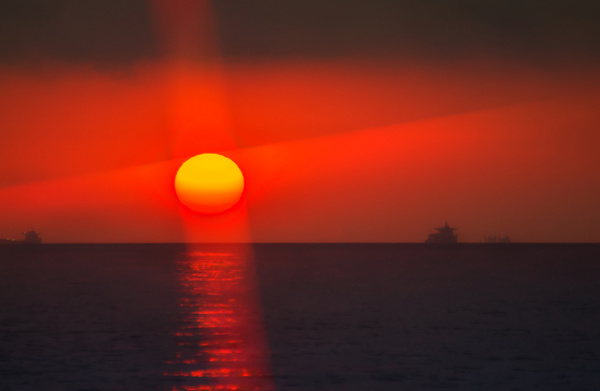 The red sun on the sea Stock Photo
