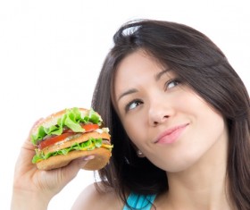 Woman eating hamburger Stock Photo 02