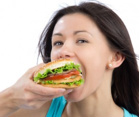Woman eating hamburger Stock Photo 03