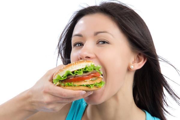 Woman eating hamburger Stock Photo 03