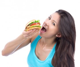 Woman eating hamburger Stock Photo 04