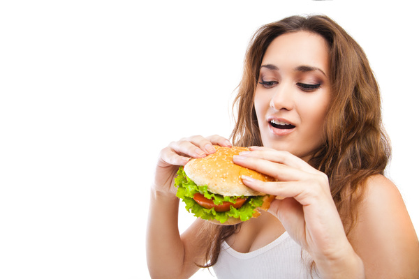 Woman eating hamburger Stock Photo 09