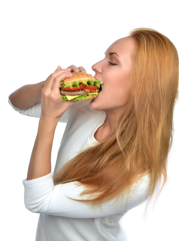 Woman eating hamburger Stock Photo 14