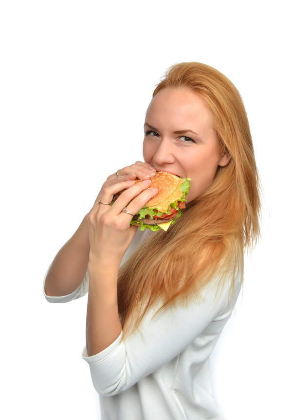 Woman eating hamburger Stock Photo 15