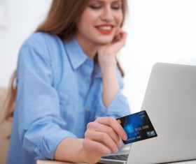 Young woman shopping online at home Stock Photo 02