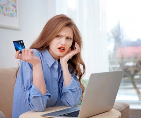 Young woman shopping online at home Stock Photo 04