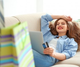 Young woman shopping online at home Stock Photo 07