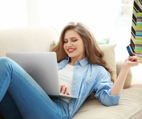 Young woman shopping online at home Stock Photo 09