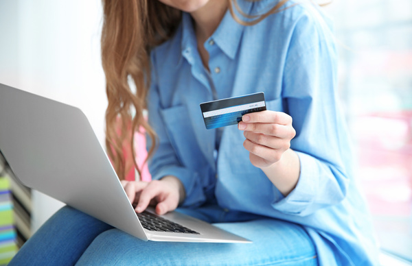 Young woman shopping online at home Stock Photo 14