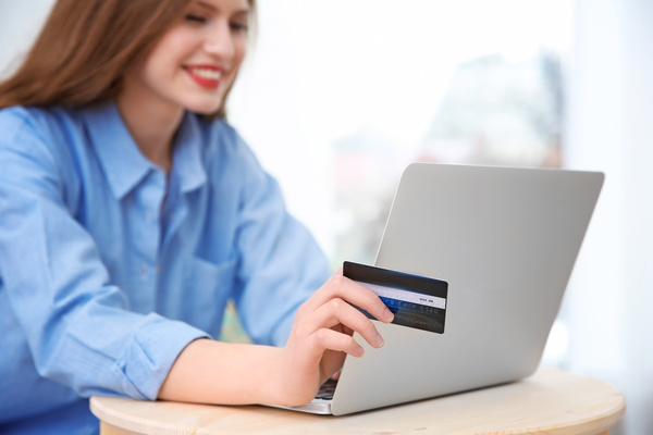 Young woman shopping online at home Stock Photo 17