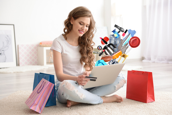 Young woman shopping online at home Stock Photo 19