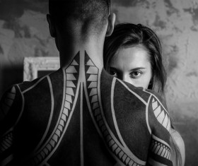 Black white picture of stylish couple with tattoo Stock Photo