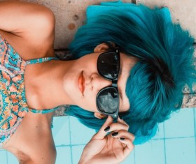 Blue hair with sunglasses woman Stock Photo
