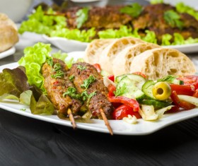 Bread skewers and salads Stock Photo