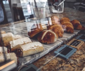 Delicious cakes displayed in glass shelf Stock Photo