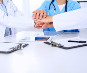 Doctors encourage each other Stock Photo