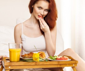 Enjoy breakfast girl in bed Stock Photo 07
