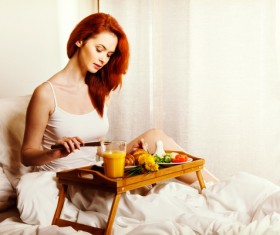 Enjoy breakfast girl in bed Stock Photo 13