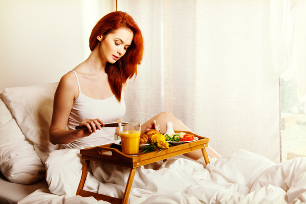 Enjoy breakfast girl in bed Stock Photo 13