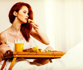 Enjoy breakfast girl in bed Stock Photo 16