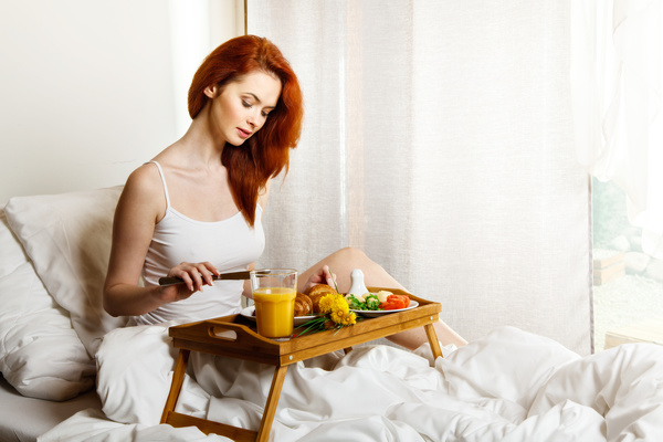 Enjoy breakfast girl in bed Stock Photo 19