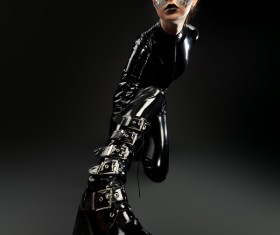 Girl in latex clothes Face is covered with sequins Stock Photo 03