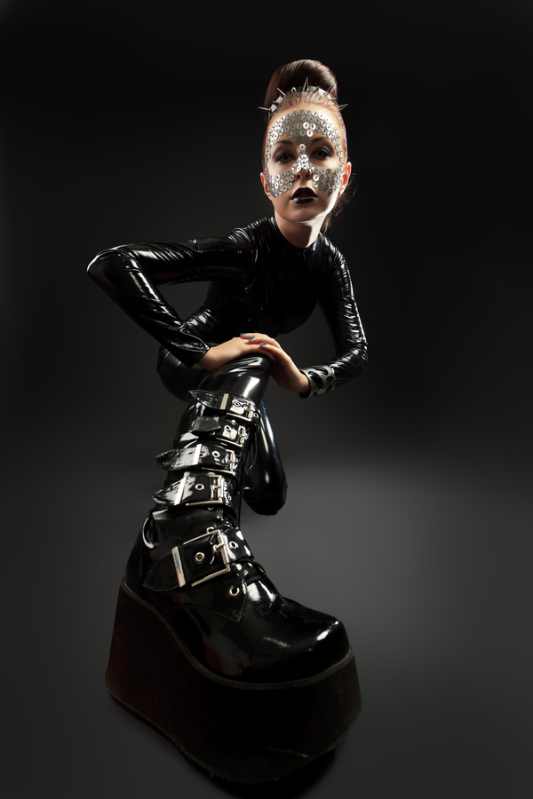 Girl in latex clothes Face is covered with sequins Stock Photo 04