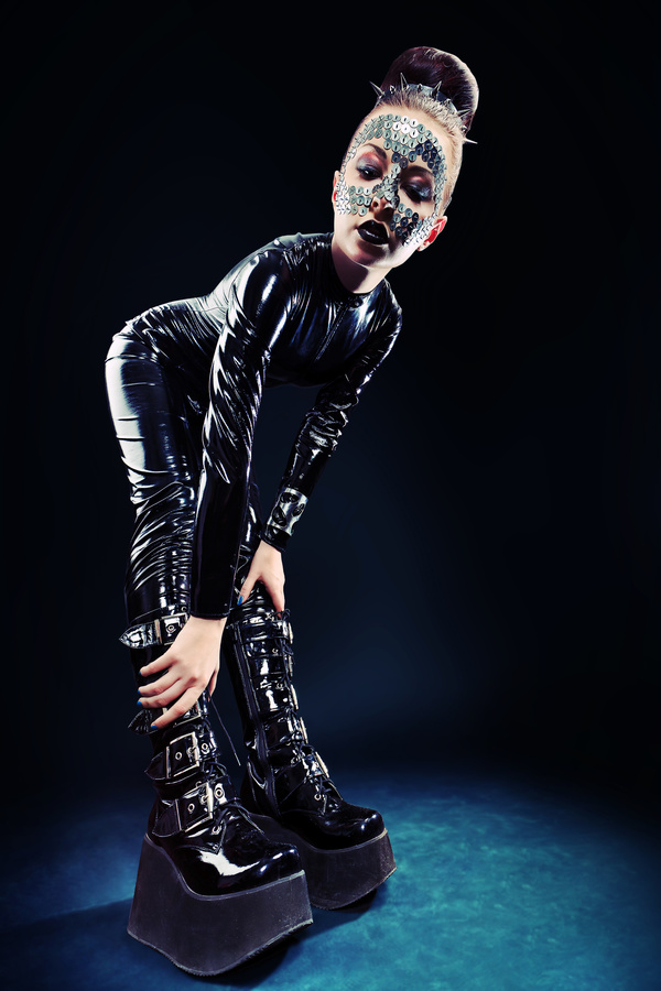 Girl in latex clothes Face is covered with sequins Stock Photo 08