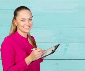 Girls writing notes Stock Photo