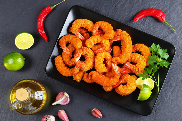 Golden fried shrimp and red pepper Stock Photo