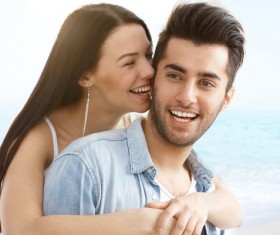 Happy young romantic couple embracing Stock Photo 06