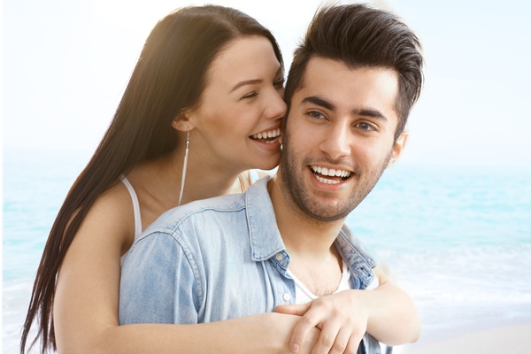 Happy young romantic couple embracing Stock Photo 06