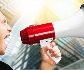 Holding a horn loud people Stock Photo 16