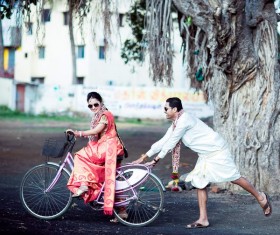 Learn to ride bike woman Stock Photo