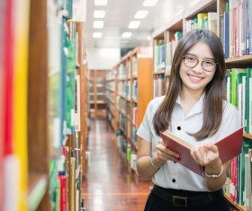Library reading female student Stock Photo