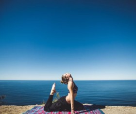 Outdoor practice yoga woman Stock Photo