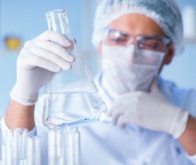 Scientists in the laboratory to observe water changes Stock Photo 01