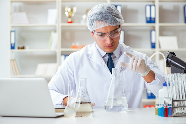 Scientists in the laboratory to observe water changes Stock Photo 02