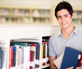 Smiling boy in the library Stock Photo