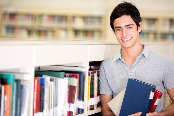 Smiling boy in the library Stock Photo