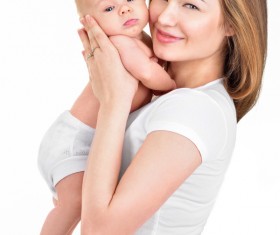 Smiling mother holding the baby Stock Photo 01