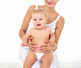 Smiling mother holding the baby Stock Photo 09