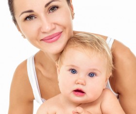 Smiling mother holding the baby Stock Photo 10